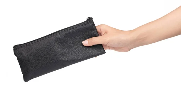 Hand holding black leather wallet isolated on white background — ストック写真