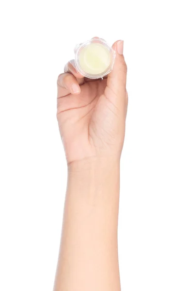 Χέρι κρατώντας ζελέ σε πλαστικά δοχεία που απομονώνονται σε λευκό backg — Φωτογραφία Αρχείου