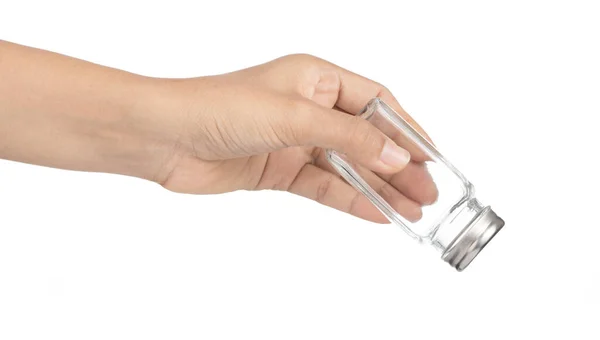 Hand houden zout shaker geïsoleerd op witte achtergrond — Stockfoto
