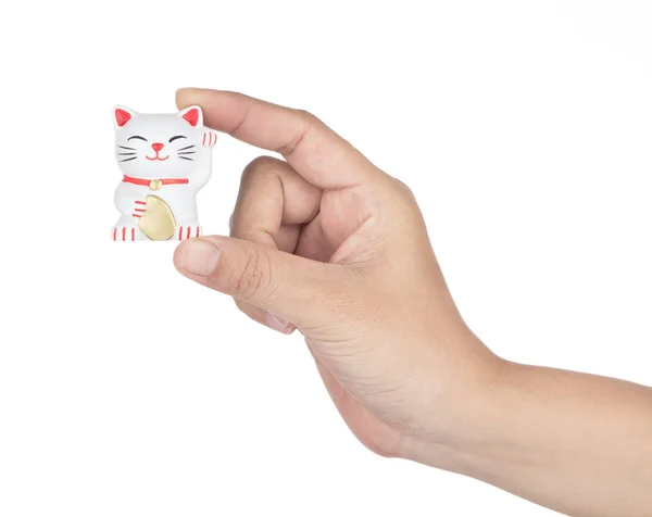 Hand holding Fridge Magnets shape of cat isolated on white backg — Stok fotoğraf