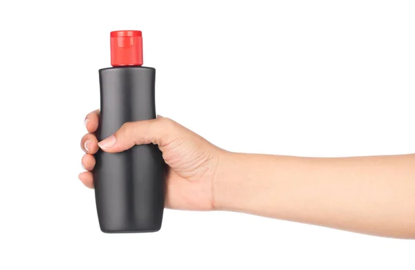 Hand vasthouden fles wax product bescherming voor auto en leer i — Stockfoto