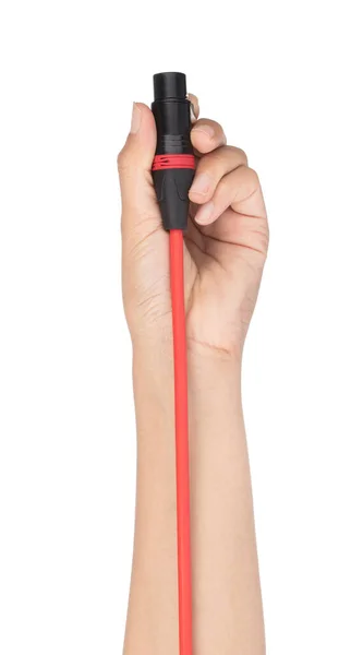 Mão segurando cabo de microfone isolado no fundo branco . — Fotografia de Stock
