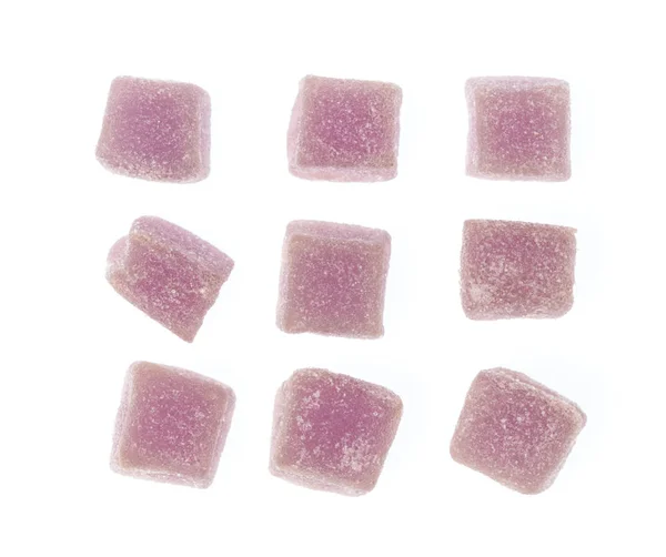 Sabroso cubo de gelatina púrpura aislado sobre un fondo blanco —  Fotos de Stock