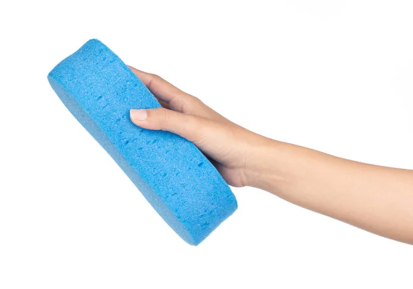 Mão segurando azul Esponja isolada no fundo branco — Fotografia de Stock