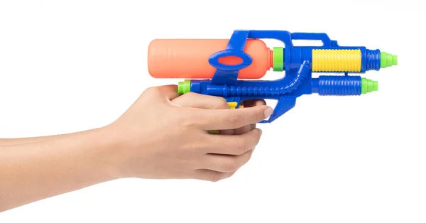 Pistola de brinquedo de água na mão isolado em um fundo branco — Fotografia de Stock