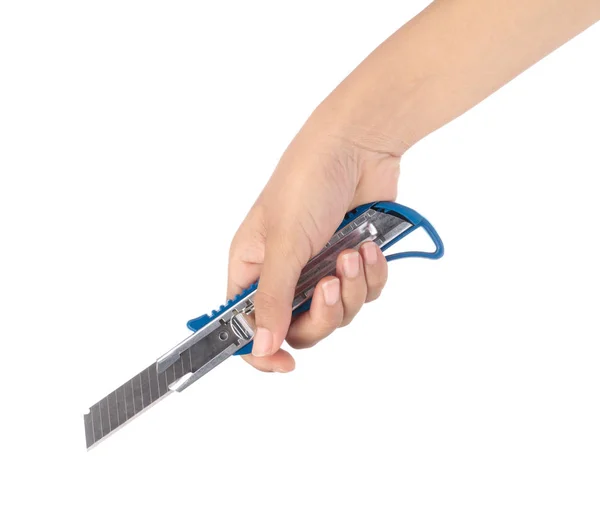 Hand holding Blue cutter knife isolated on white background — Stok fotoğraf