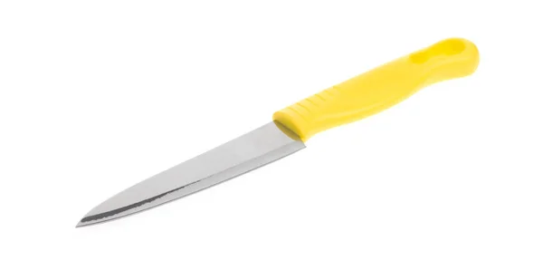 Желтый нож на белом фоне — стоковое фото