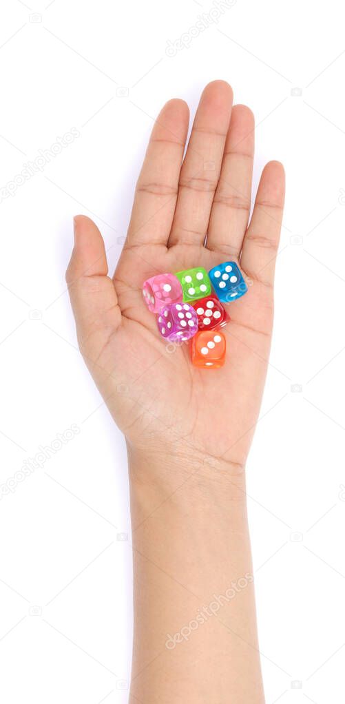 hand holding colored dice isolated on white background