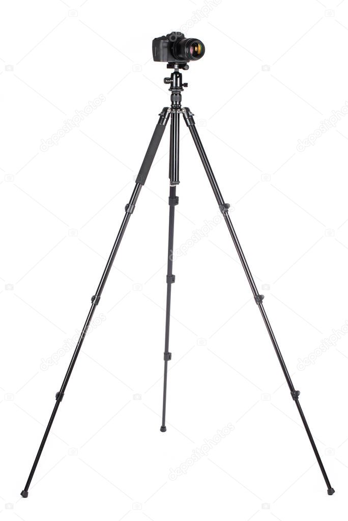 Camera on tripod isolated on a white background.