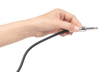 hand holding Audio jack connection of microphone isolated on whi