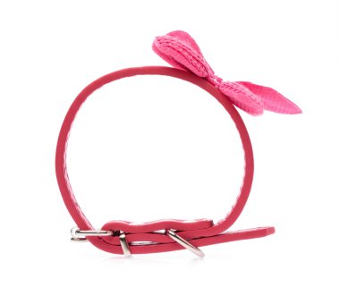 Pink pet collar with polka dots and bow tie isolated over white 