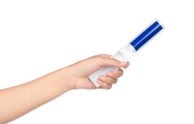 Adhesive roller for cleaning clothes isolated on a white backgou