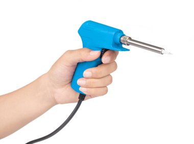 hand holding Gun electric solder for soldering electronic work i