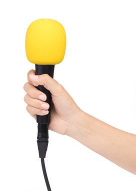hand holding a microphone with sponge on head isolated on white 