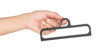hand holding hanger isolated on white background