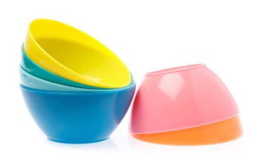 Empty colorful plastic bowl isolated on white background