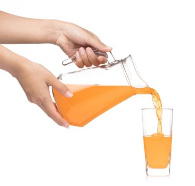 hand pouring Peach fruit juice isolated on a white background 