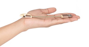 hand holding Charger USB cable isolated on white background