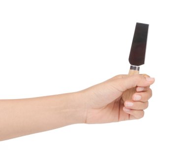 El ele tutuşan Trowel beyaz arka planda izole edildi