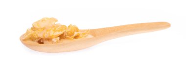 Cereal on spoon isolated on white background.