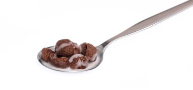 spoon of chocolate Cereal with milk isolated on white background