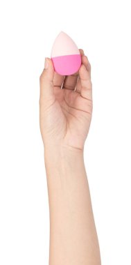 hand holding Pink egg beauty sponge isolated on a white backgrou