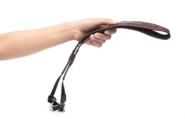 hand holding camera strap isolated on a white background