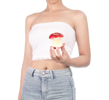 young woman wearing white strapless dress and jeans holding red 