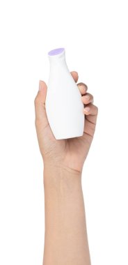 Hand holding cosmetic bottle isolated on white background