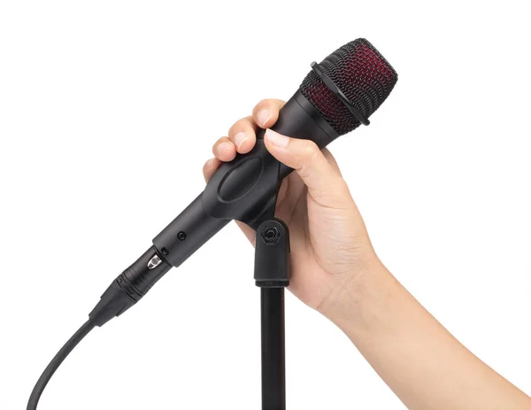 Mão segurar microfone isolado no fundo branco — Fotografia de Stock