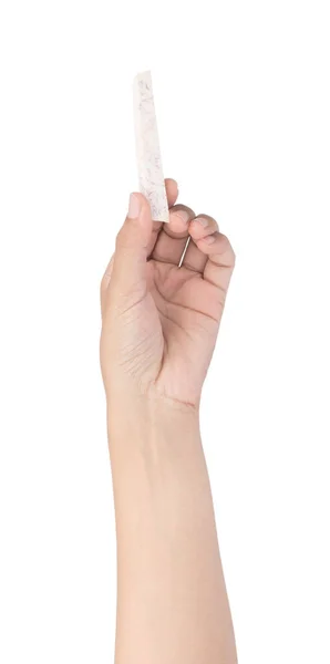 Рука тримає шматочок таро ізольовано на білому фоні — стокове фото