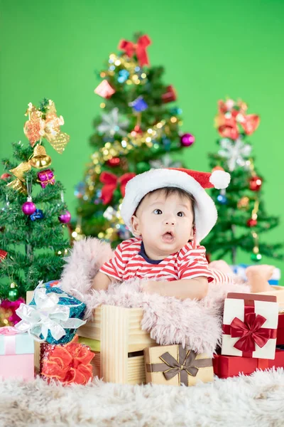 Cute Little Baby in wood box with Christmas box gift on a Christ — Stock Photo, Image
