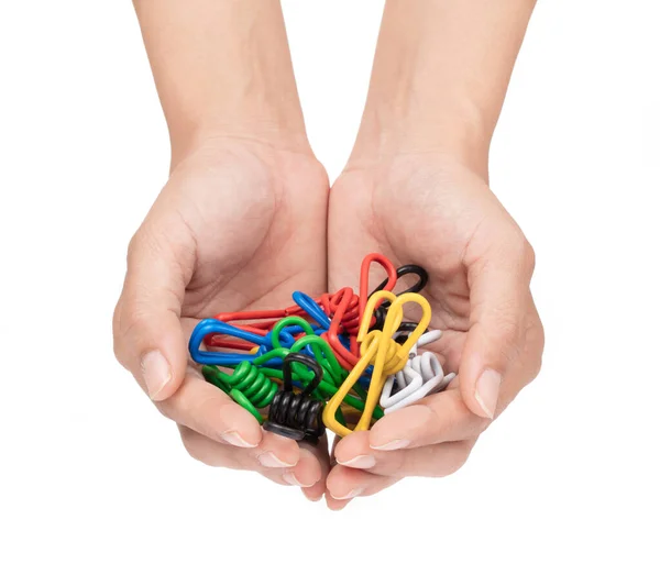 Hand holding wire spring hose clips isolated on white background — Stockfoto