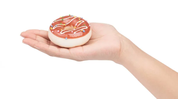 Рука держа пончик изолированы на белом фоне. — стоковое фото