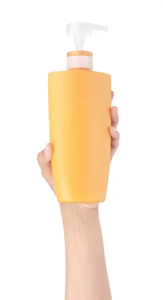 Mão segurando tubo de cosmético isolado no fundo branco — Fotografia de Stock