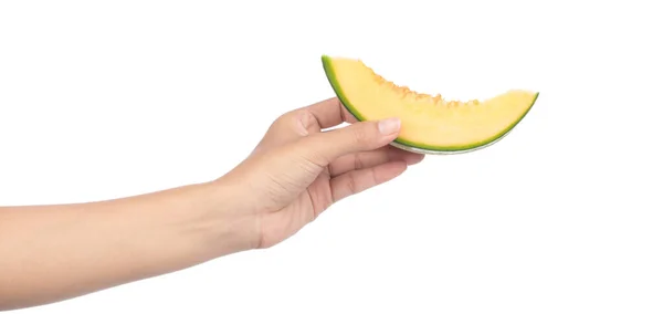 Mano che tiene melone melone affettato isolato su Backgroun bianco — Foto Stock