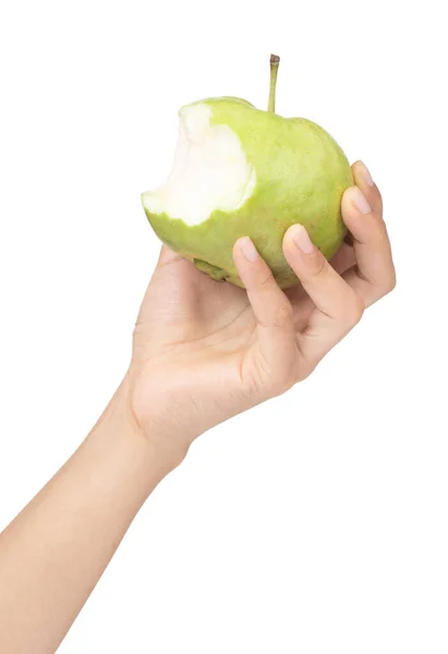 Hand holding bite of guava fruit isolated on white background — 스톡 사진