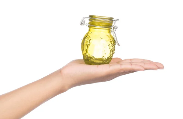 Hand holding jar isolated on white background — Stock Photo, Image