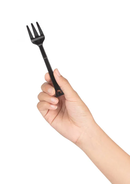 Mano sosteniendo Negro de tenedor aislado sobre fondo blanco . —  Fotos de Stock