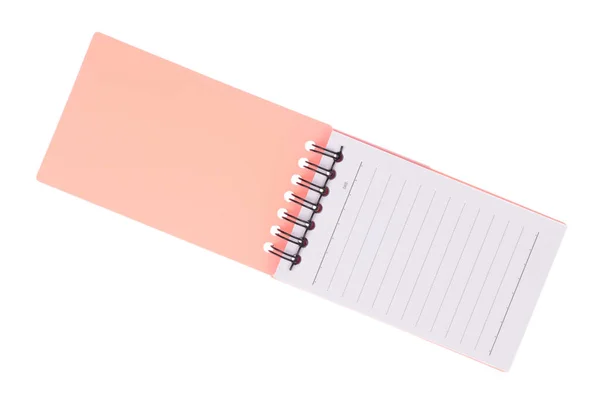 Pink note book isolated on a white background — ストック写真