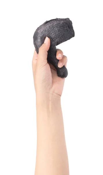 Hand met verse zwarte kippendijen geïsoleerd op witte rug gr — Stockfoto