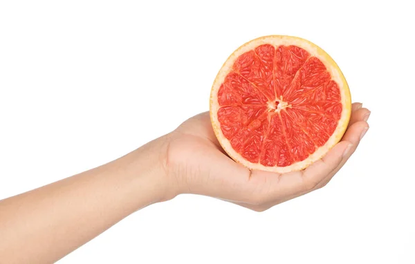 Hand holding ripe grapefruit slice isolated on white background. — Stock Photo, Image