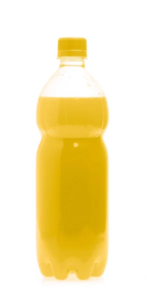 Бутылка с вкусным напитком на заднем плане — стоковое фото