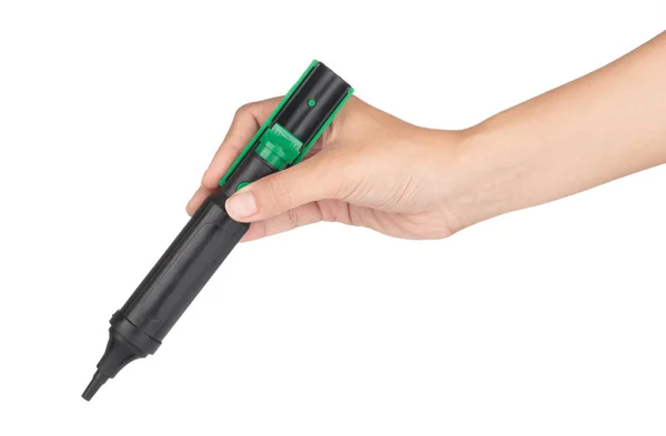 Hand holding Solder sucker tool or syringe for suctioning the so — Stockfoto