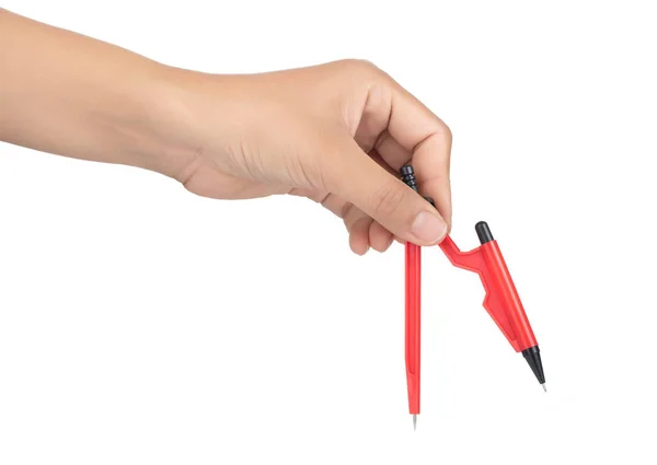 Hand holding Red compasses for drawing isolated on white backgro — Stockfoto