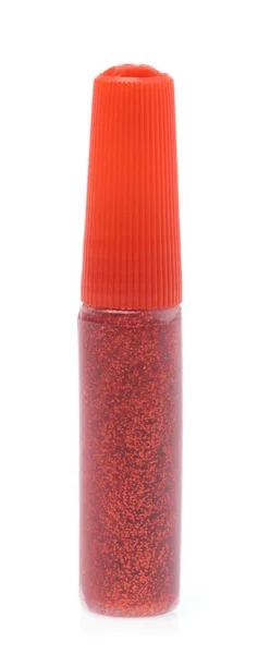 Röd pinne av färg glitter gel isolerad på vit bakgrund. — Stockfoto