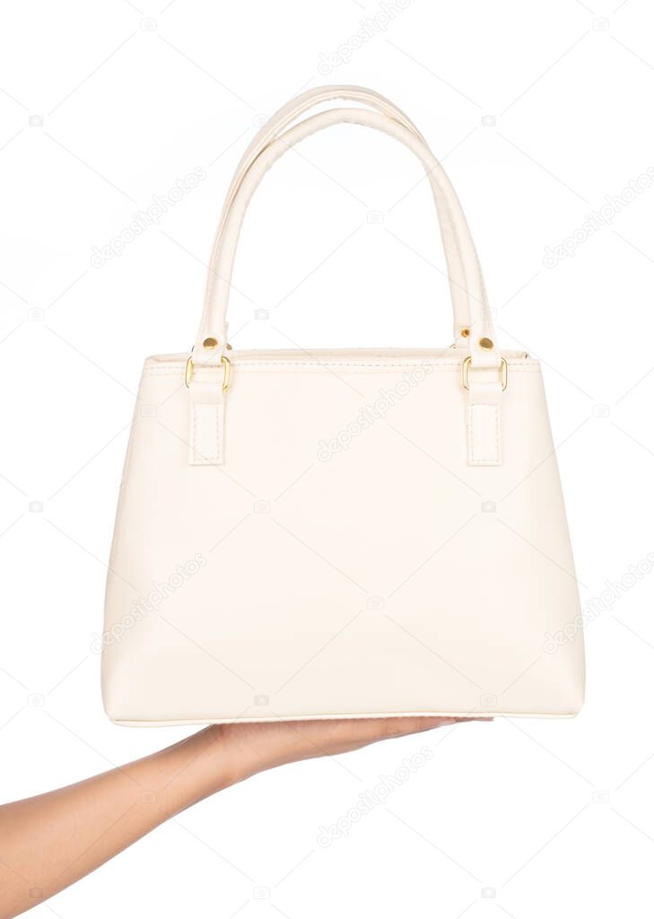 hand holding Bag Women's fashion accessories isolated on white b