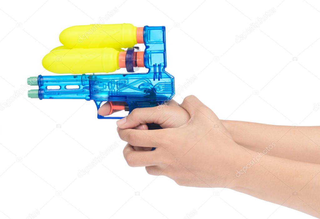 hand holding Plastic water gun isolated on white background