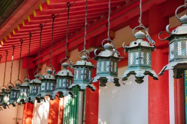 Hanging lamps or lanterns at temple's corridor 