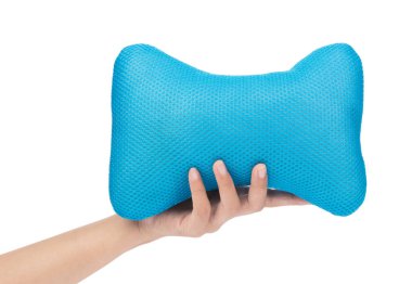 hand holding neck pillow isolated on white background
